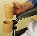 TUMBLE FORMS CUP + HOLDER FOR WHEELCHAIR CLIP ON CUP HOLDER+CUP POLYSTYRENE * Clips onto any wheelchair, cane, walker, etc. * Large-handled cup fits securely into holder * Cup features snap-on lid with an opening for drinking * Dishwasher safe up to 125°F high-impact polystyrene * Holds up to 8 oz. * Plastic-coated clips prevent scratching and provide a strong hold