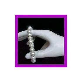 Click here to buy MAGNETIC Therapy White Pearl Bracelet Reduces HAND PAIN.