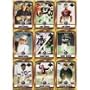 2006 Topps Football Hall of Fame Tribute Complete Mint 9 Card Insert Set. Includes the 6 Members of the "Class of 2006", Troy Aikman, Harry Carson, Reggie White, John Madden, Rayfield Wright, and Warren Moon Plus 1963 Inductees Jim Thorpe, Sammy Baugh and Bronko Nagurski.