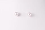 Boucles d'oreilles perles de Mayorque rosées en argent 925 µ. Poids total 0,7g. Un classique avec une pointe d'originalité. Image du produit