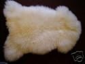 BEAUTIFUL  100% GENUINE SHEEPSKIN RUG. 85cm x 70cm