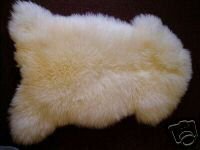 BEAUTIFUL  100% GENUINE SHEEPSKIN RUG. 85cm x 70cm