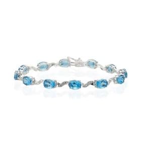 0.05 Ct Diamond and 19 Cts Swiss Blue Topaz Bracelet in 14K White Gold by