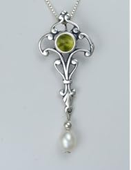 A Sweet Sterling Silver Necklace Accented with Genuine Peridot
