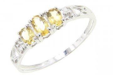 Buy 0.66 Ctw. 10K Citrine Diamond Accent Three Stone Ring by Jewelersclub.com