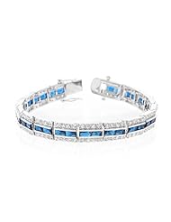 White Gold Rhodium Bonded 7.25 Inch Bracelet with Three Rows of Radiant Blue and Round Cut Clear Cubic Zirconia in a Channel Setting and a Box Clasp in Silvertone