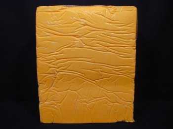 California Sharp Cheddar - 40 to 42 LB Block by Cheese Express