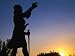 Silhouetted Statue on Plateia Athinaton Areopoli, Peloponnese, Greece Photographic Poster Print by Glenn Beanland, 24x18