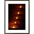 Time-elapsed view of the sun setting Photography Framed Art Poster Print by Richard Nowitz, 21x29