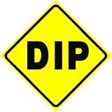 DIP ZONE CROSSING warning road street sign