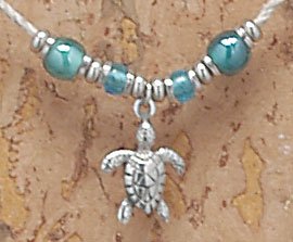 Click here to buy Hawaiian Beaded Pewter Hemp Chord Choker- Honu Turtle.