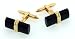 Classically styled 18kt yellow gold cufflinks with onyx accent