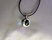 Search : Moonface Clutch Rainbow Glass Ball Necklace