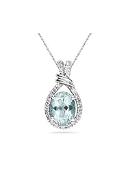 Oval Shaped Aquamarine and Diamonds Pendant in White Gold