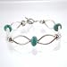 Sterling Silver and Turquoise Bracelet with Flower Designs.#8607