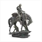Cowboy Riding Horse On Rock Figurine