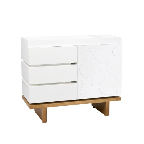 Nurseryworks Two-Wide Changer in Snow with Circles on Light Wood Platform