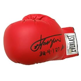 Joe Frazier Autographed Everlast Boxing Glove with ''Joe Frazier 32-4-1-27 KO'' Inscription