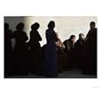 Palestinian Women Sit as They Mourn During the Funeral of Four Al-Aqsa Martyrs' Brigades Militants Photographic Poster Print, 40x30