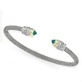 14K and Silver Cuff with blue Topazand Diamond D .10 Bt 1.00