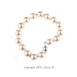 Single Strand 7-7.5 Inch 10MM Pink Shell Pearl Bracelet