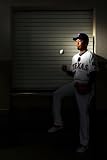 Surprise, AZ - February 28: Texas Rangers Photo Day - Koji Uehara Photographic Poster Print by Jamie Squire, 12x18