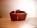 Hull covered casserole mirror brown drip edge Image