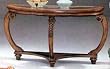 Hand Carved Leaf Detail Round Glass Top Sofa Table By Coaster Furniture