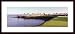 Golf Course In Hawaii Resort by unknown 36.00X12.00 Framed with Black Wood Frame