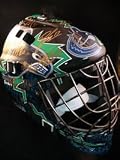 Signed Canucks, Vancouver (2010-11) Authentic Vancouver Canucks Goalie Mask by the 2010-11 Team