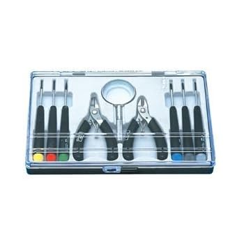 Kit d\'outils 9 pièces pour électronique (tournevis, loupe, pinces) Kit d\'outils 9 pièces pour électronique (tournevis, loupe, pinces)