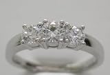 315EKTMDS3L. SL160  Estate Three Stone Diamond Ring T.W. 0.78 Ct.