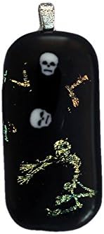 Jewels of Fire Halloween Pendant with Golden Skeleton who skids on a Black Background with 2 Skulls Floating over His Head