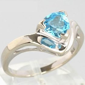 An Estate 14K White Gold Blue Topaz Ring by 