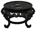 Round black carved elevated stand
