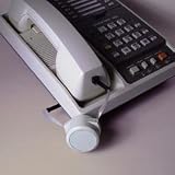 CORD-MINDER. RETRACTING TELEPHONE CORD. 8 FEET
