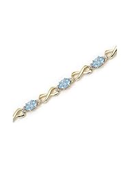 10K Yellow Gold Oval Aquamarine and Diamond Bracelet by Jewelry Mountain