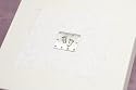 Keepsake Box decorated with stunning pewter plaque embossed with footprints mounted on off white handmade paper