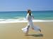 Woman Running Along Beach, Kovalam, Kerala State, India Photographic Poster Print by Gavin Hellier, 24x18