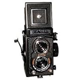 Seagull 109, 6cm x 6cm Medium Format Twin Lens Reflex (TLR) Camera with Built-in 75mm f/3.5 Lens & Shutter/Aperture Window in Front of Viewfinder.