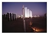 800 Mirror-Winged Solar Panels Convert Even the Last Rays of the Day Directly into Electricity Photographic Print by Jim Sugar, 24 x 18