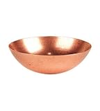 copper prayer bowl by red flower