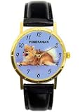 Pomeranian dog watch ladies size 1 inch dial. Gold tone case with black leather band.