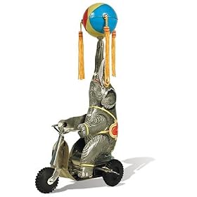 'Elephant on Bike' Classic Tin Wind Up Toy Elephant spins the ball on his trunk while riding his... by Schylling