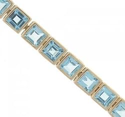 Princess Blue Topaz Tennis Bracelet in Yellow Gold 9 CTTW