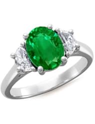 Oval Emerald and Diamond Three Stone Ring