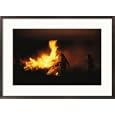 Managers of the wildlife reserve burn bushes to simulate fires that keep the prairie healthy Photography Framed Art Poster Print by Joel Sartore, 29x21