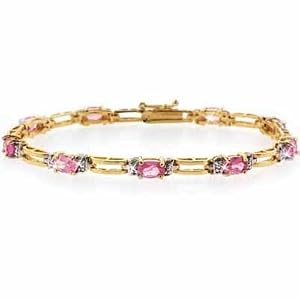 18K Gold over Sterling Silver Genuine Diamond Accent and oval Pink Sapphire... by 