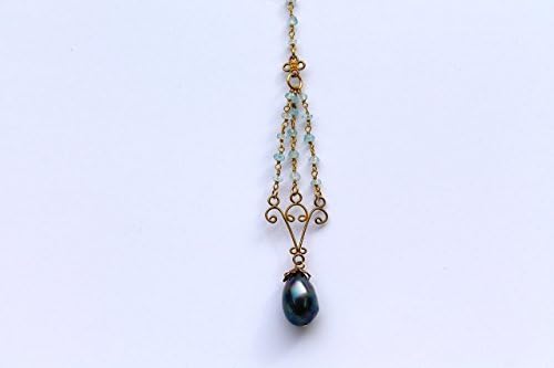 Tahitian pearl necklace with a vintage style thin chain choker with long pendant of aquamarine and gold ending with large black baroque pearl