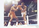 RIDDICK BOWE AUTOGRAPHED BOXING AWESOME PHOTO VS EVANDER HOLYFIELD (BOXING)